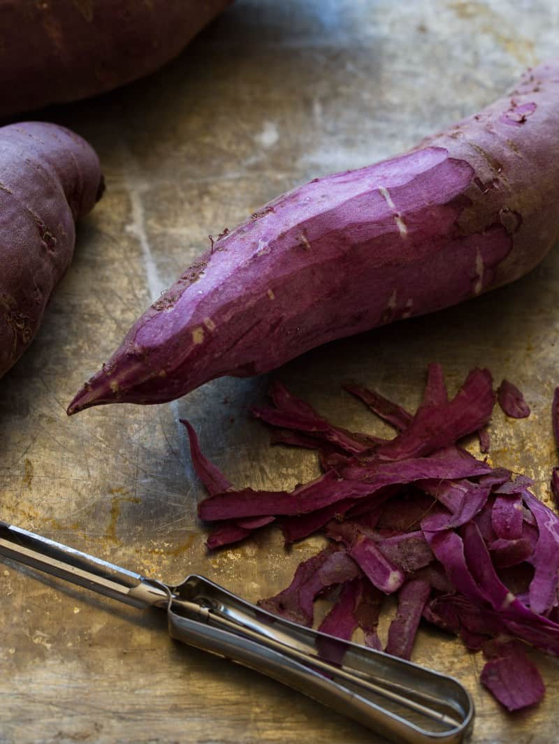 Purple sweet potatoes peeled for Mashed Purple Sweet Potatoes.