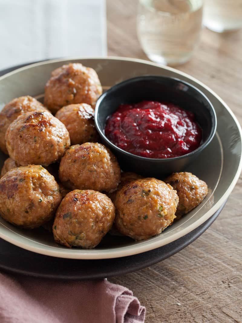 Perfect holiday recipe for Herbed Turkey Meatballs with a Barbecue Cranberry Sauce.