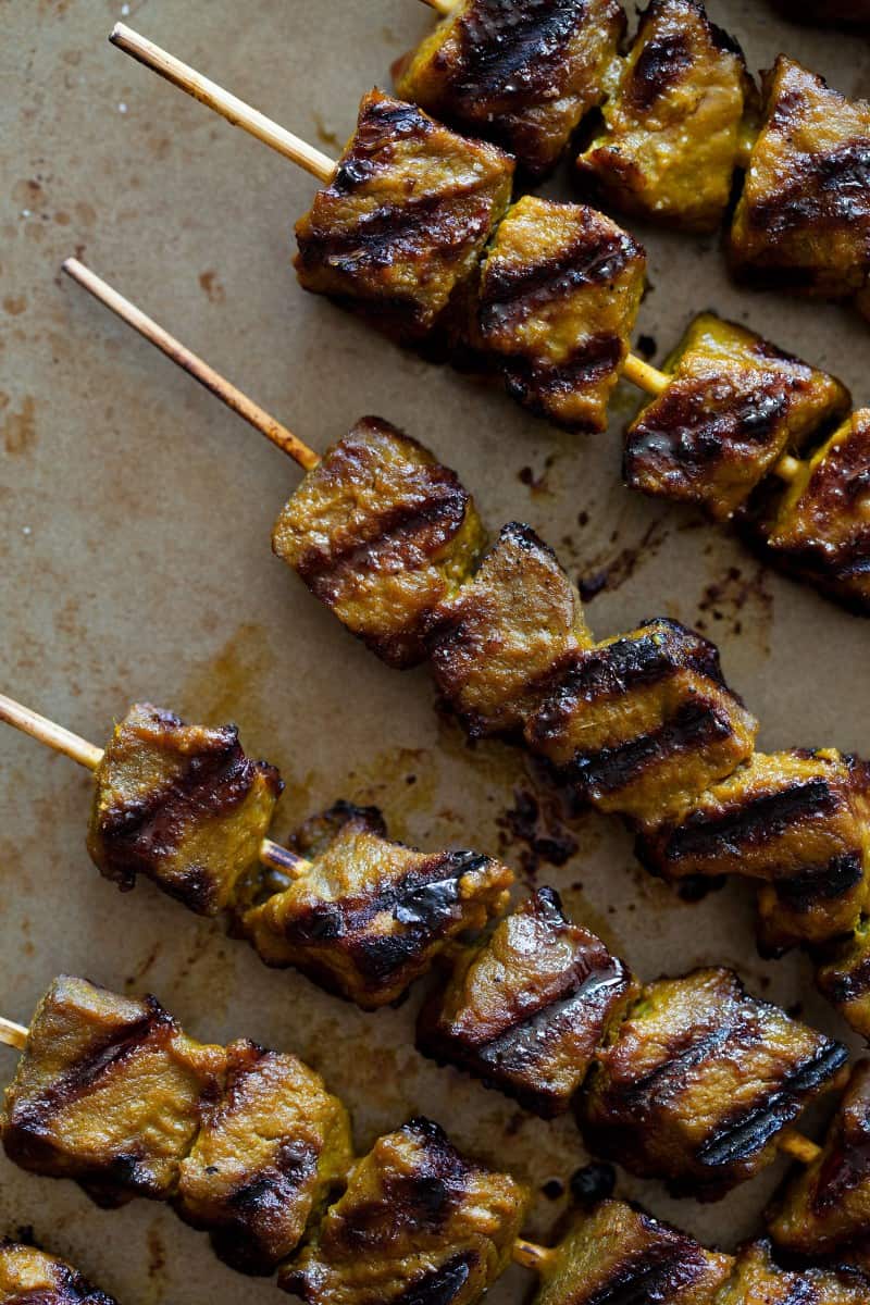 Grilled cubes of beef with a peanut dipping sauce.