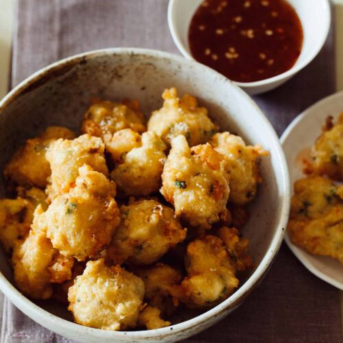 https://www.spoonforkbacon.com/wp-content/uploads/2012/02/shrimp-fritters-with-a-spicy-honey-drizzle-1-500x500.jpg