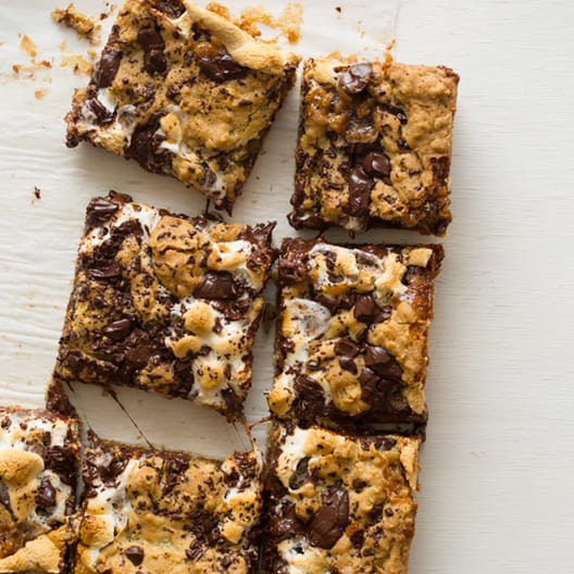 Oatmeal s'mores bars on a surface cut into squares. 