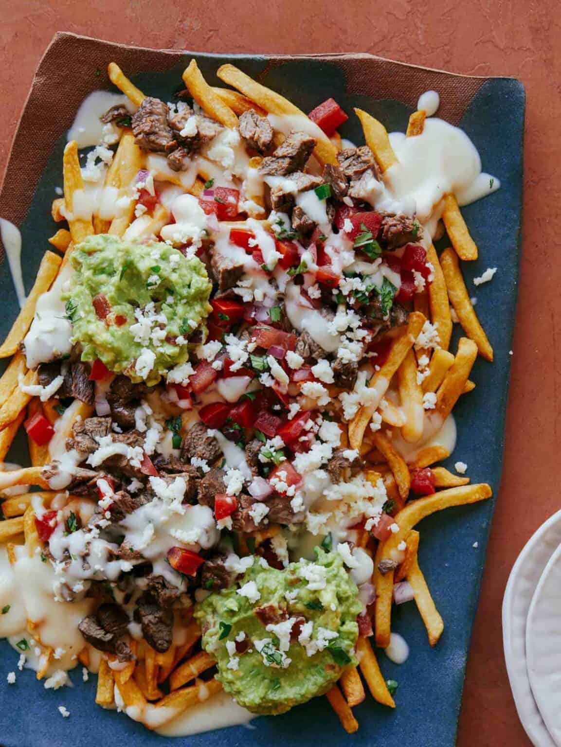 Mouthwatering carne asada fries at Tacos and Suaves