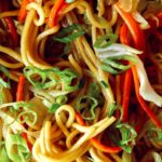 Close up on chow mein noodles so you can see the ingredients.