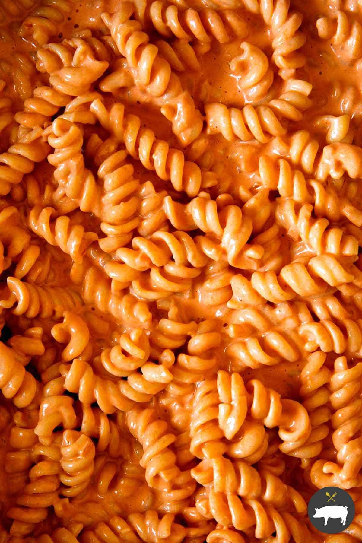 Close up on saucy vodka sauce with pasta.