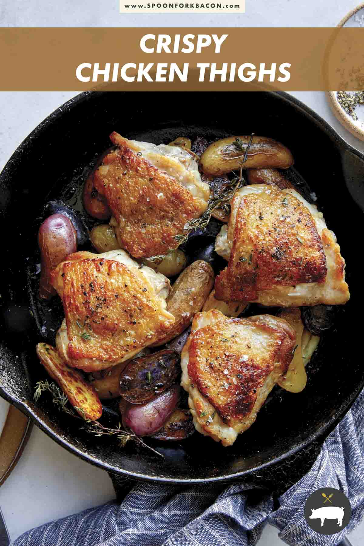 Crispy chicken thigh recipe in a skillet.