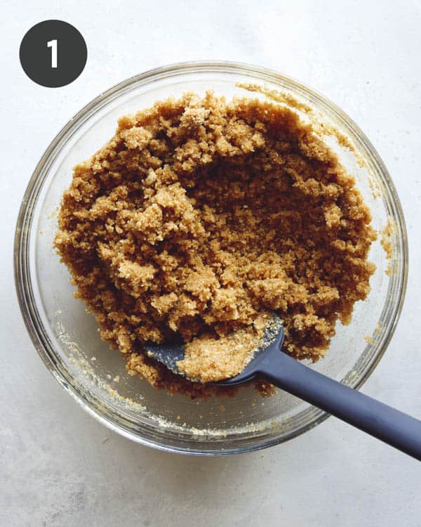 Pie crust being mixed in a bowl. 