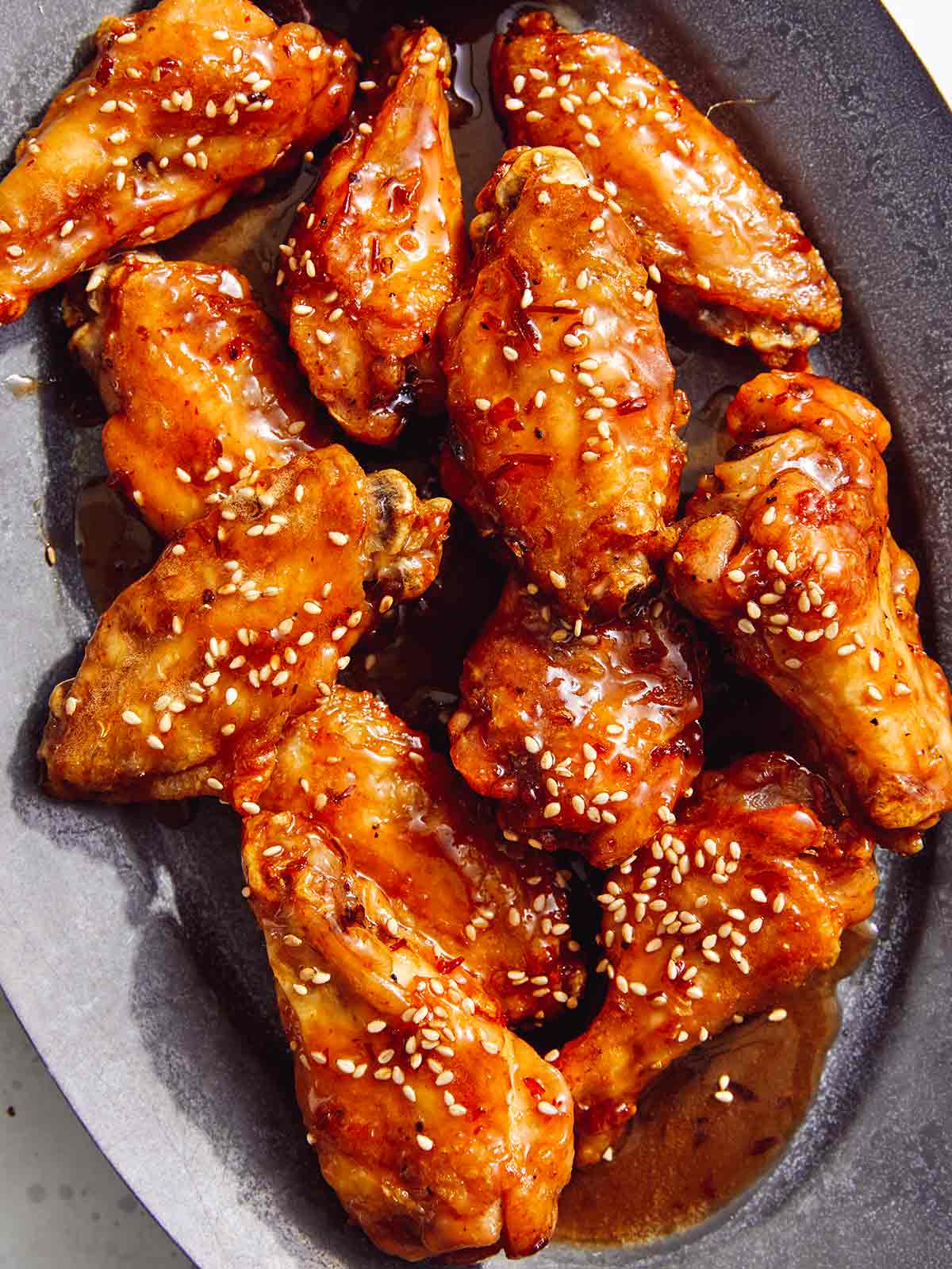 Air Fryer Chicken Wings with Honey Buffalo Sauce