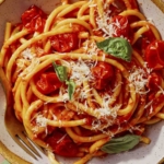 Tomato sauce pasta in a bowl.