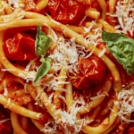 Close up on a bowl of fresh tomato sauce pasta.