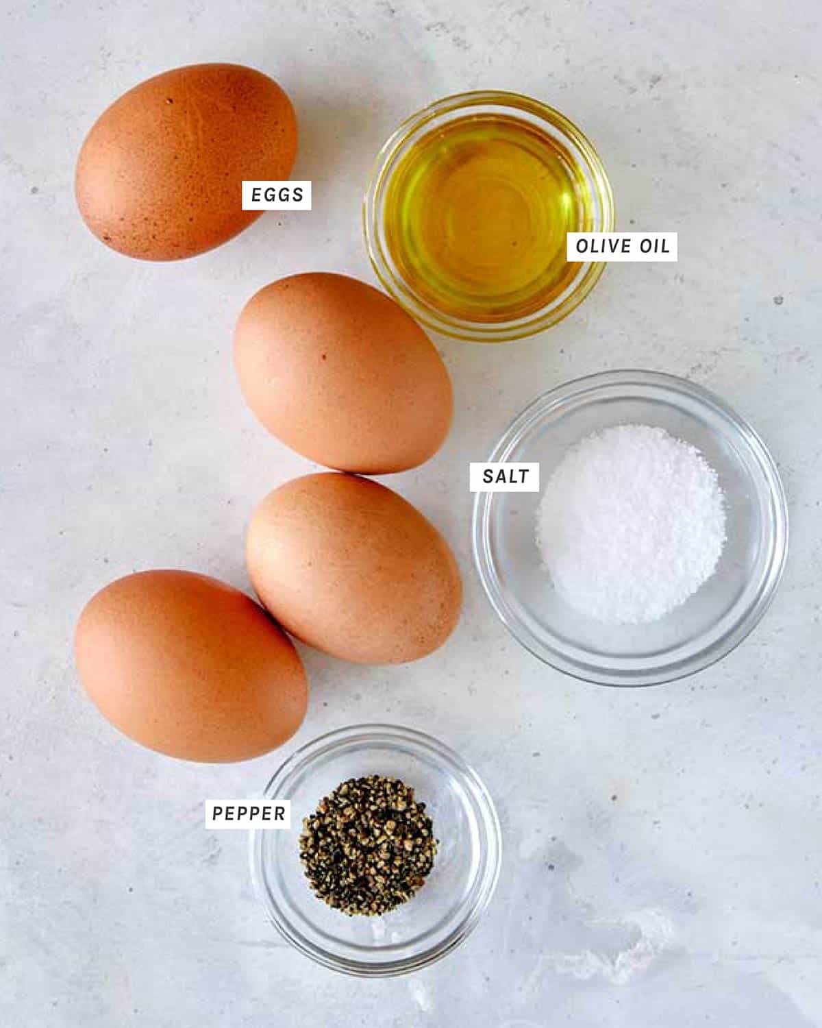 Fried egg ingredients on a kitchen counter. 