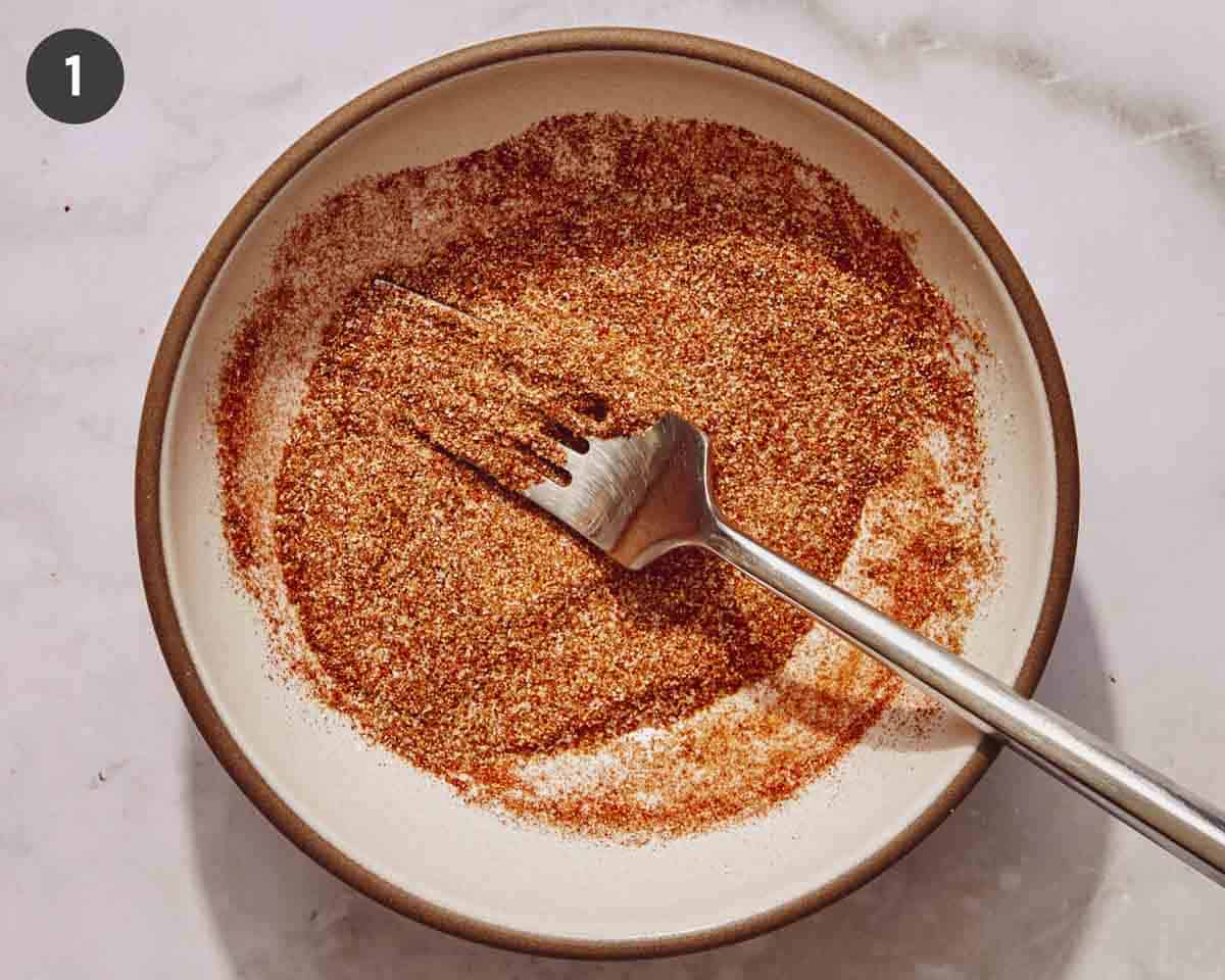 Seasoning mixture in a bowl for corn ribs.