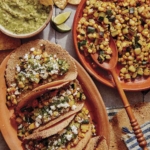 Vegetarian Tacos on a platter with salsa on the side.