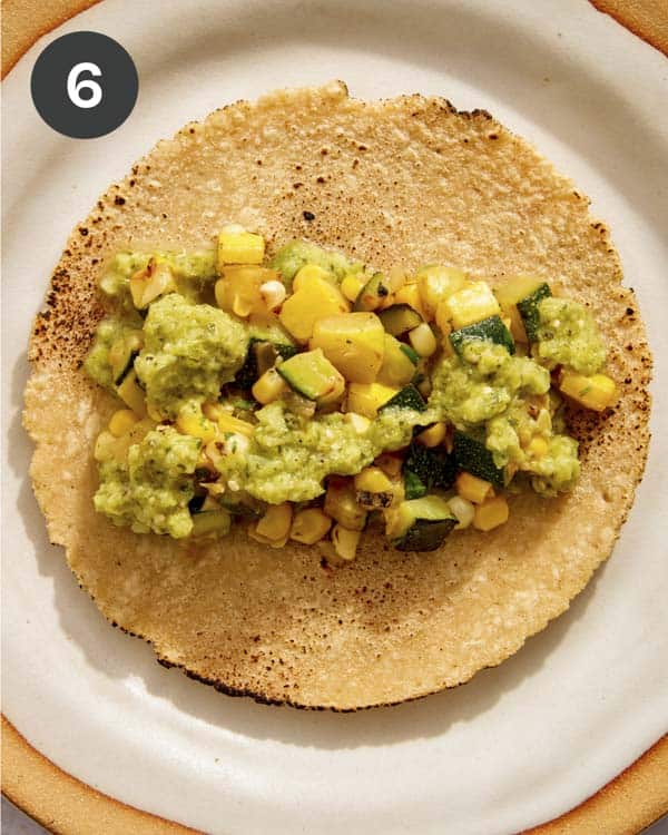 A vegetarian taco on a plate.