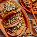 Vegetarian tacos recipe with tacos on a plate.