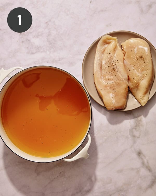 Chicken stock and seasoned chicken breast.