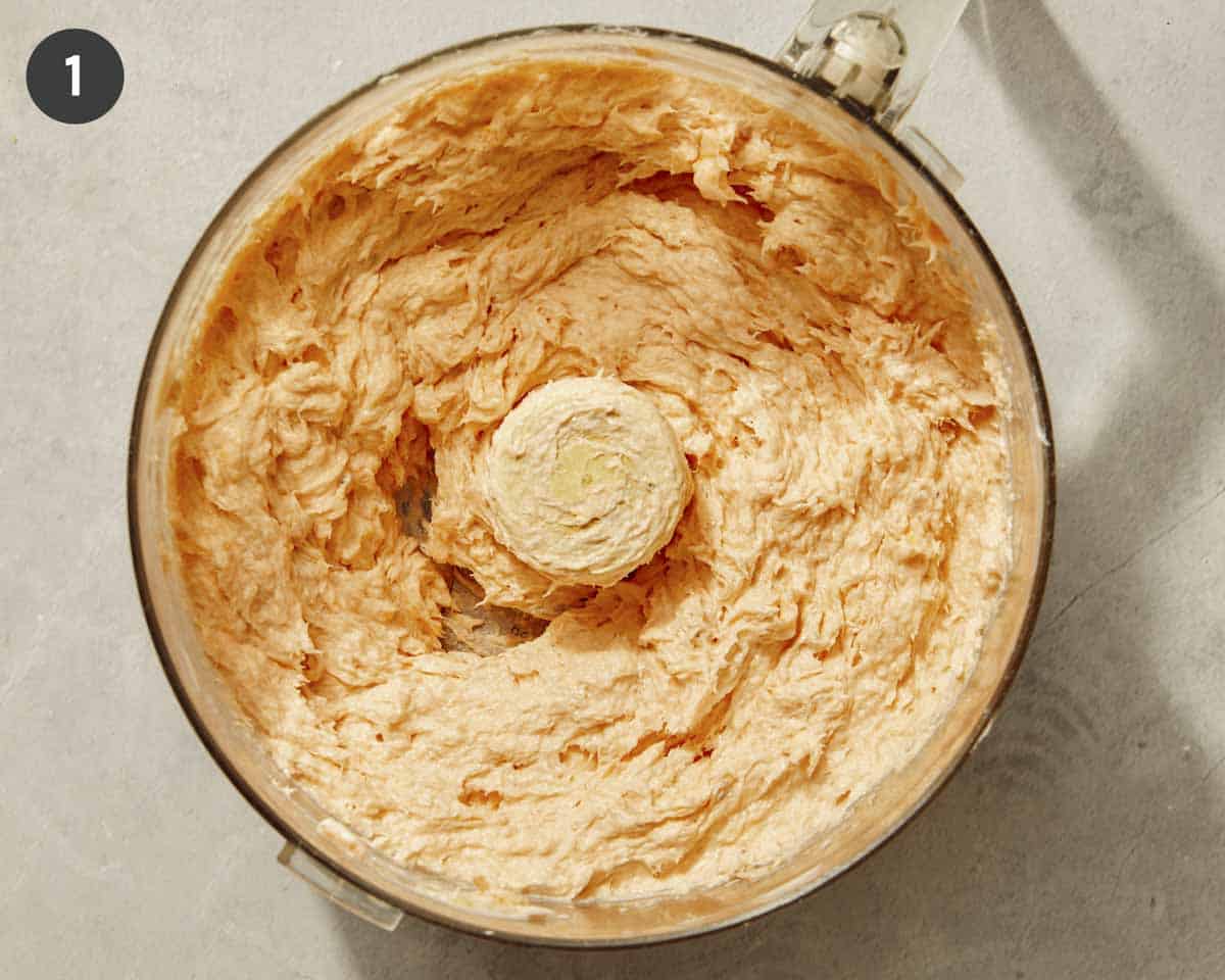 Smoked salmon dip ingredients in a food processor all blended up. 