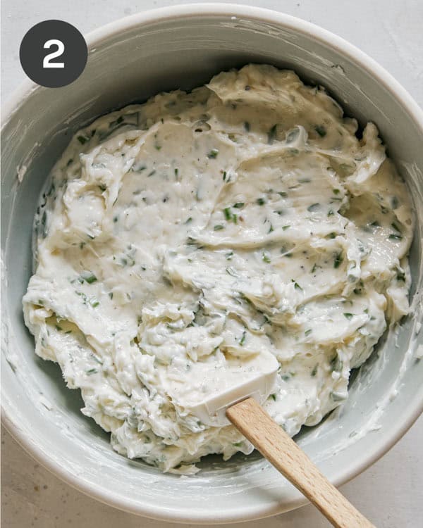 Garlic bread spread mixed together in a bowl.